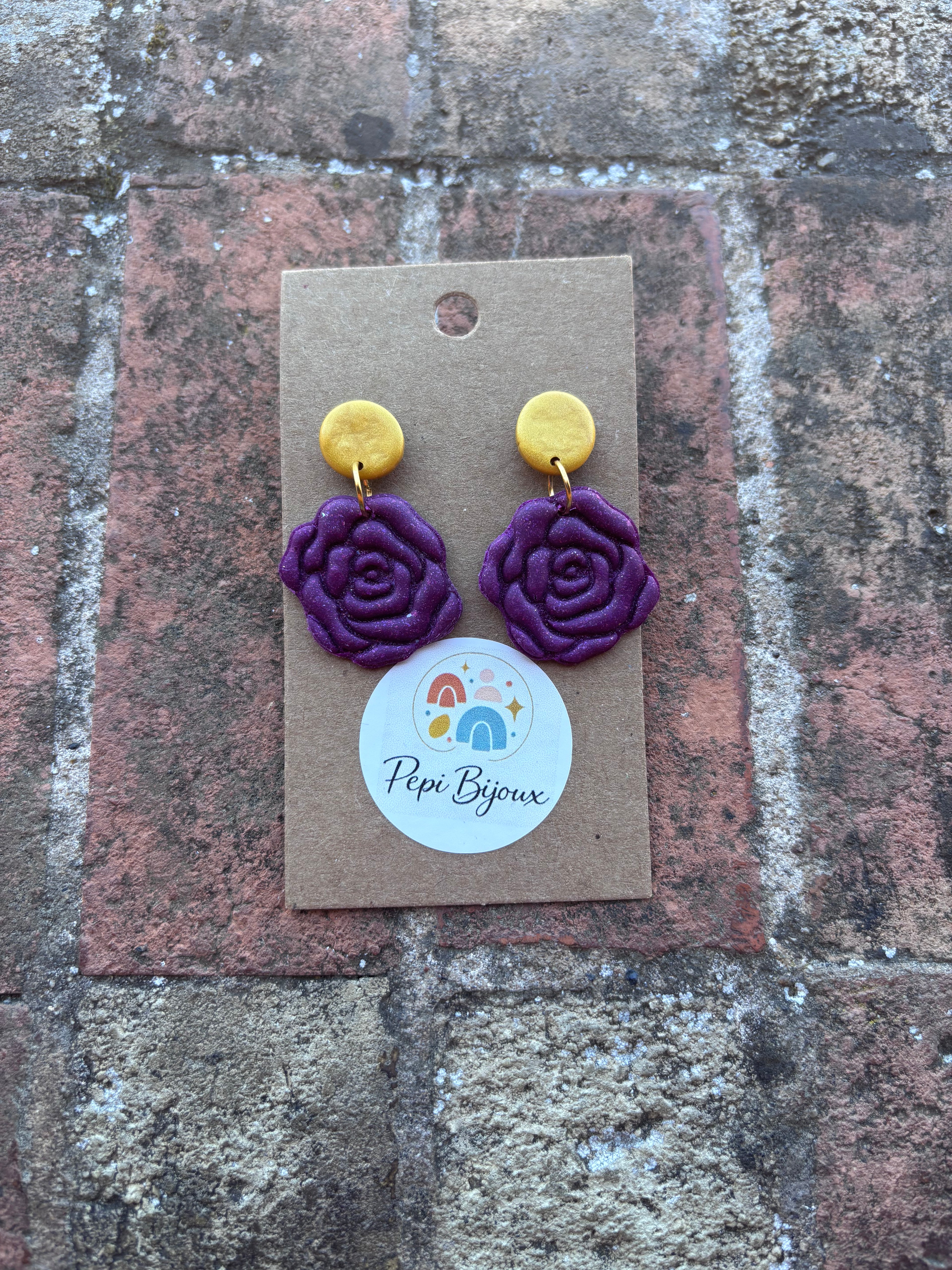 Luque (dorado y morado)